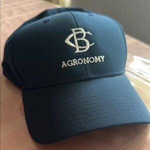 Adidas blue golf cap adjustable strap with AGRONOMY embroidered in front